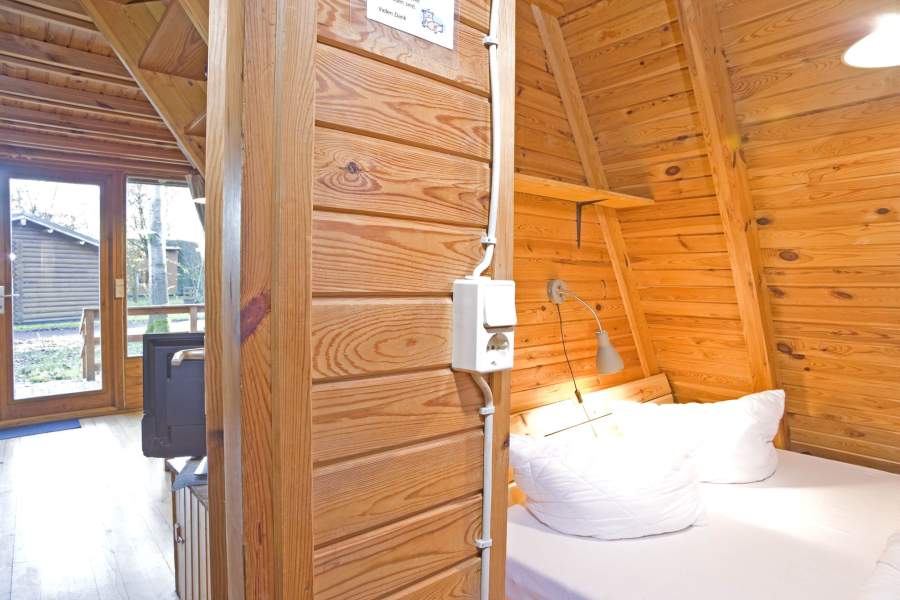 Foto von dem Schlafzimmer im Erdgeschoss vom Nurdachhaus 304