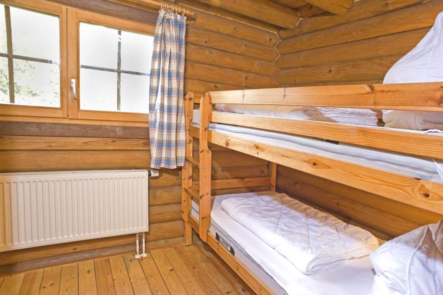 Foto von dem Schlafzimmer mit Etagenbett im Blockhaus 331.
