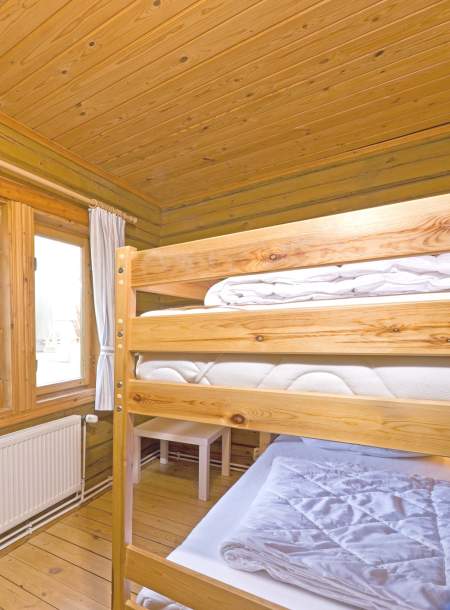 Foto von dem Schlafzimmer mit Etagenbett im Blockhaus 336.