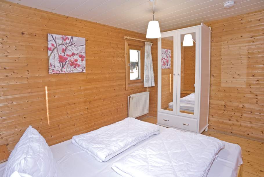Foto von dem Schlafzimmer mit Doppelbett im Ferienhaus 364.