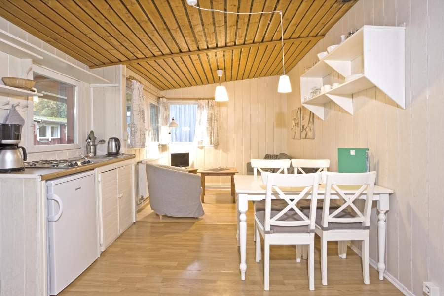 Foto von der Küche, dem Wohnzimmer und dem Essbereich