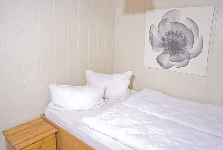 Foto von dem Doppelbett im Chalet 5