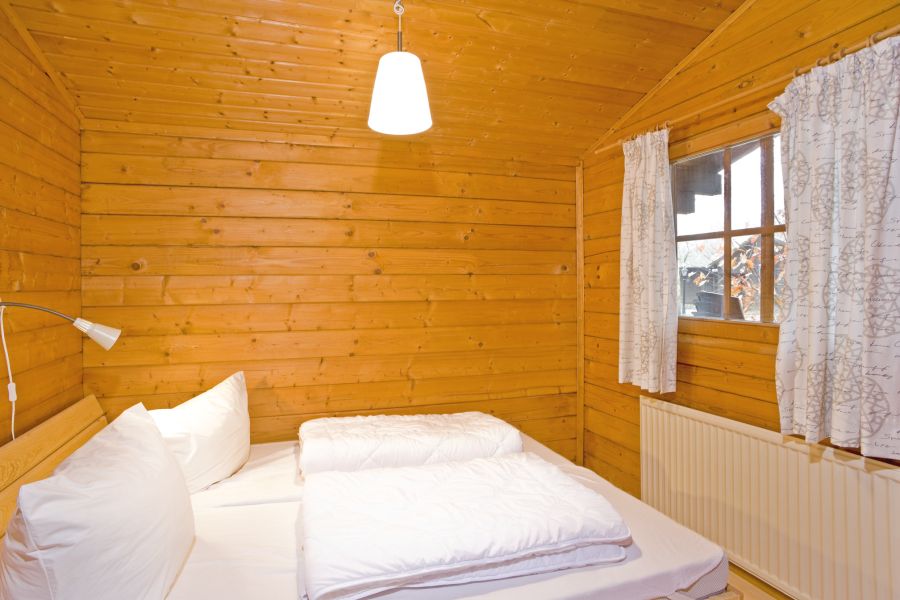 Foto von dem Schlafzimmer mit Doppelbett im Ferienhaus 362.