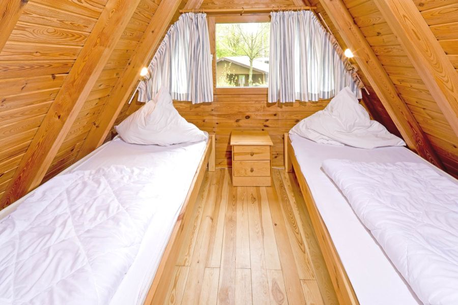 Foto von dem Schlafzimmer mit Einzelbetten im Nurdachhaus 378.