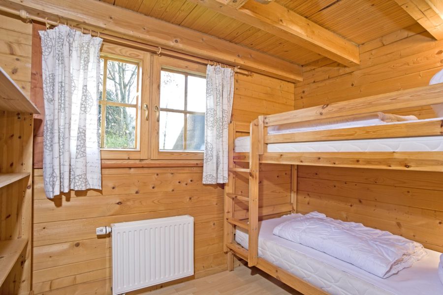 Foto von dem Schlafzimmer mit Etagenbett im Blockhaus 327.