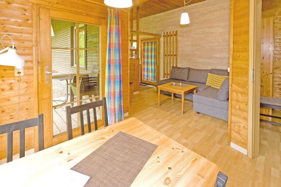 Foto von dem Essbereich mit offenen Wohnbereich im Ferienhaus 375.