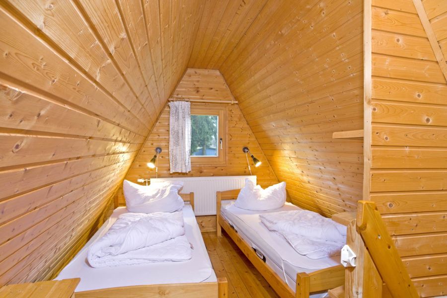 Foto von dem Schlafzimmer mit Einzelbetten im Nurdachhaus 150