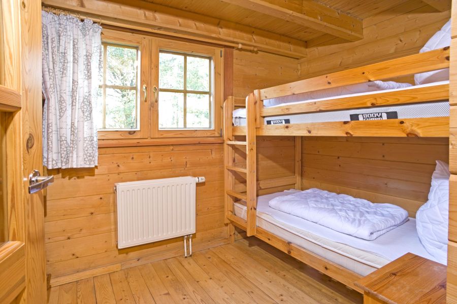 Foto von dem Schlafzimmer mit Etagenbett im Blockhaus 326.
