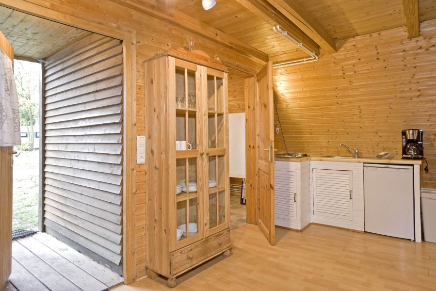 Foto von dem Eingangsbereich mit Küche im Nurdachhaus 150