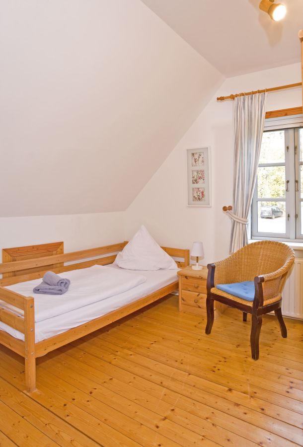 Foto des Ferienzimmers mit zusätzlichem Einzelbett