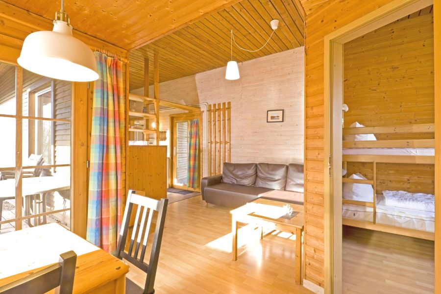Foto von dem Wohn- und Essbereich im Ferienhaus 374.