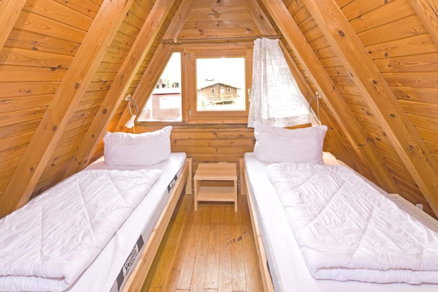 Foto von dem Schlafzimmer mit Einzelbetten im Nurdachhaus 338.