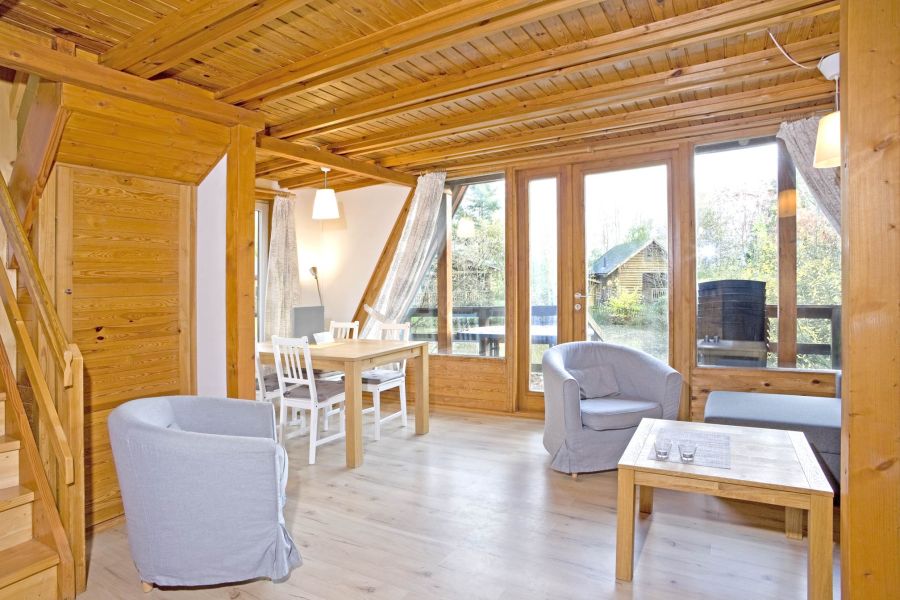 Foto von dem Wohn- und Essbereich im Nurdachhaus 338.