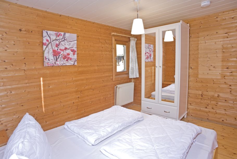 Foto von dem Schlafzimmer mit Doppelbett im Ferienhaus 364.